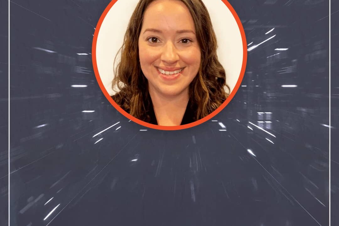 woman's face in white circle with orange stroke on a dark gray background