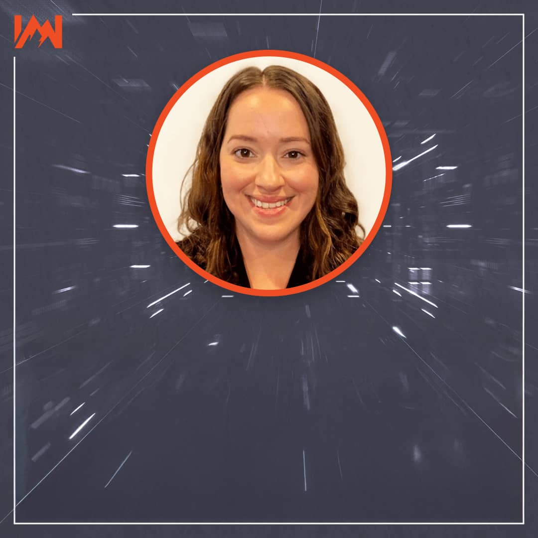 woman's face in white circle with orange stroke on a dark gray background