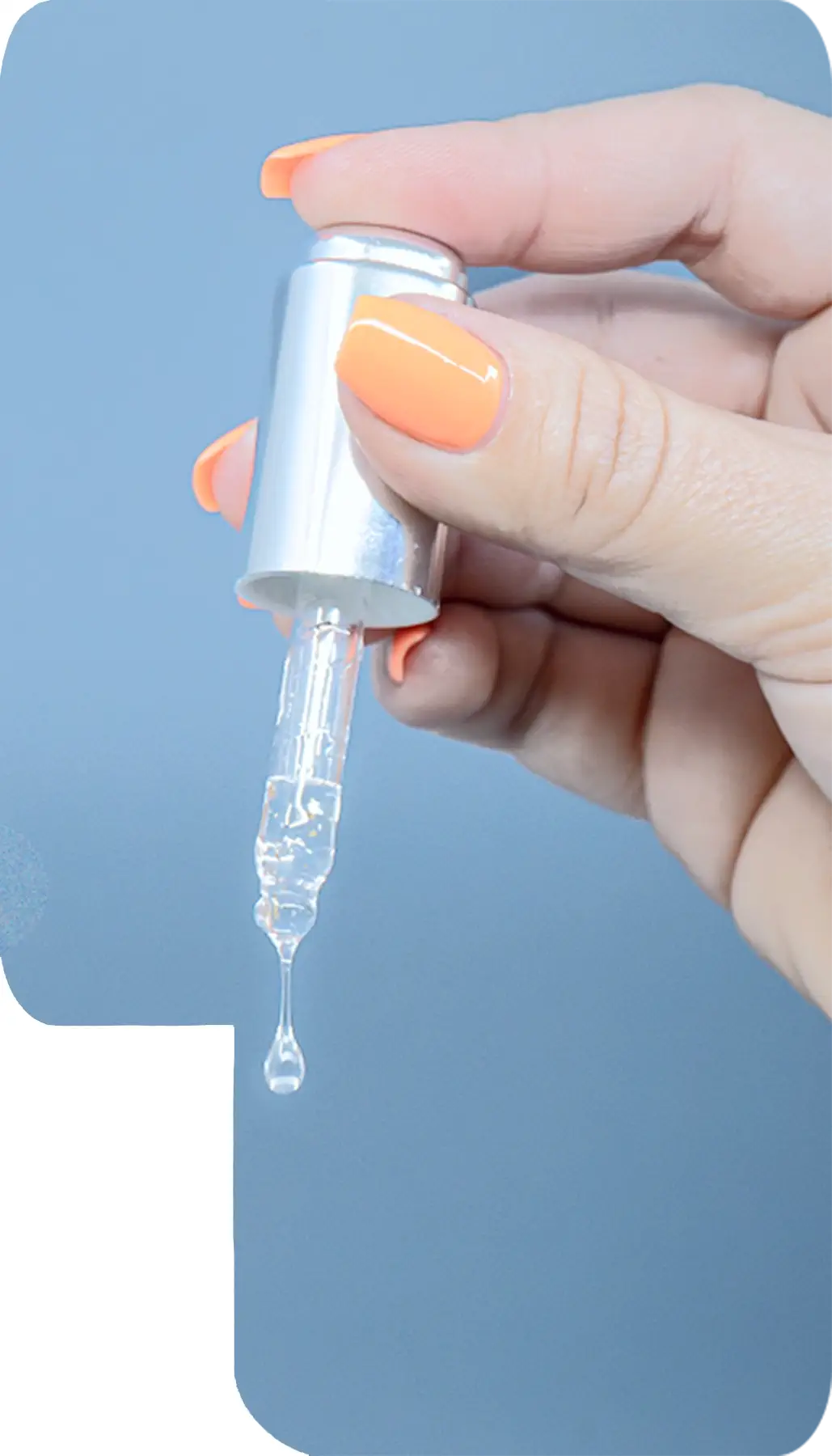 Female hand with eyedropper